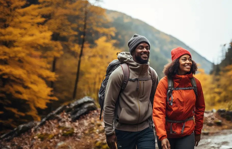 two people hiking in the woods