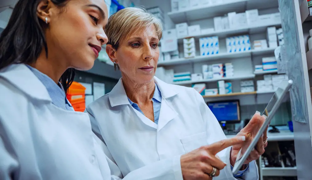 Women discussing prescription drug formularies