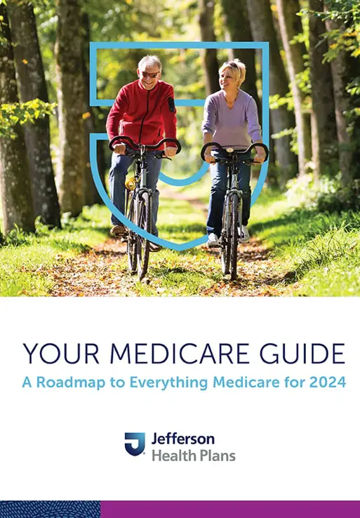 cover of the Medicare guide showing older couple biking