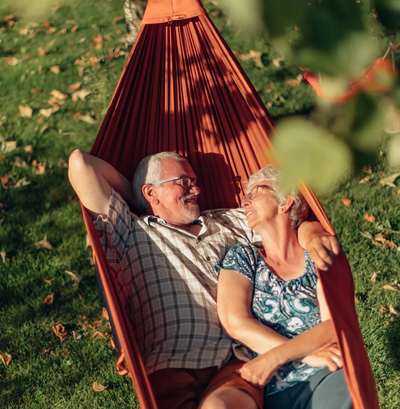 older couple together in a hammock